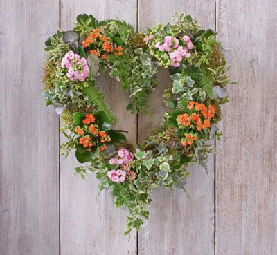 Mixed garden heart | Shrewsbury - A symbol of love and life intertwined, the mixed garden heart wreath is a beautiful tribute to honor the memory of a loved one at their final farewell.
