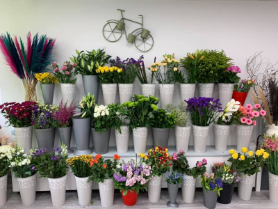 Florist Choice Gift-Wrap - This traditional wrap of flowers will be professionally made with the finest blooms on the day.