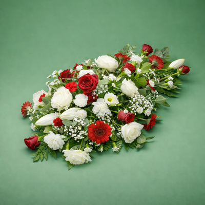 Single Ended Spray SYM-301 - This red and white single ended spray is handmade by our talented florists using the freshest flowers to guarantee a loving tribute. Same day delivery may not be possible on this design – please contact us to discuss your requirements.