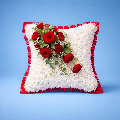 Pillow SYM-333 - Pillows are chosen to signify a final, comfortable resting place and this design with red rose spray is the ideal final tribute.